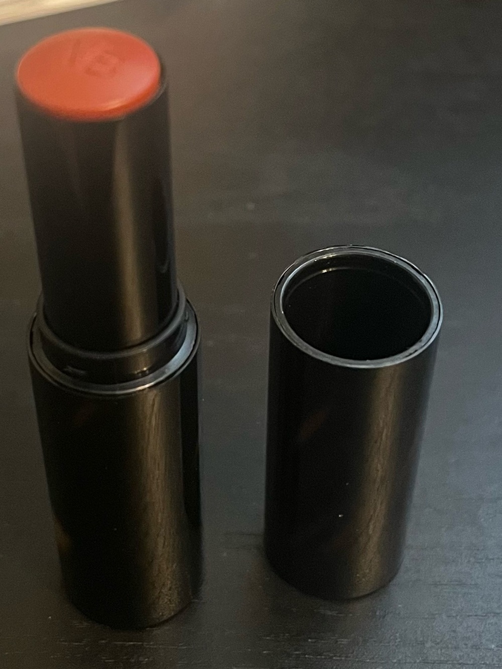 Victoria Beckham cheeky posh cream blush stick in miniskirt